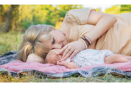 Mom with a newborn baby in her arms, a Person Photo by yanadjana