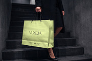 Paper Shopping Bag Mockup with Model, a Packaging Mockup by graphypix (Thumbnail 1 of 4)