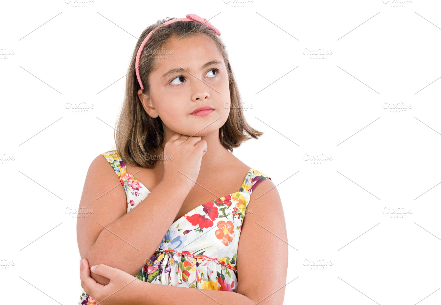 Adorable girl with flowered dress thinking, a Person Photo by José Manuel Gelpi