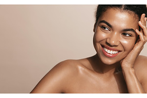 Smiling young woman with glowing, a Beauty & Fashion Photo by ringsaroundme