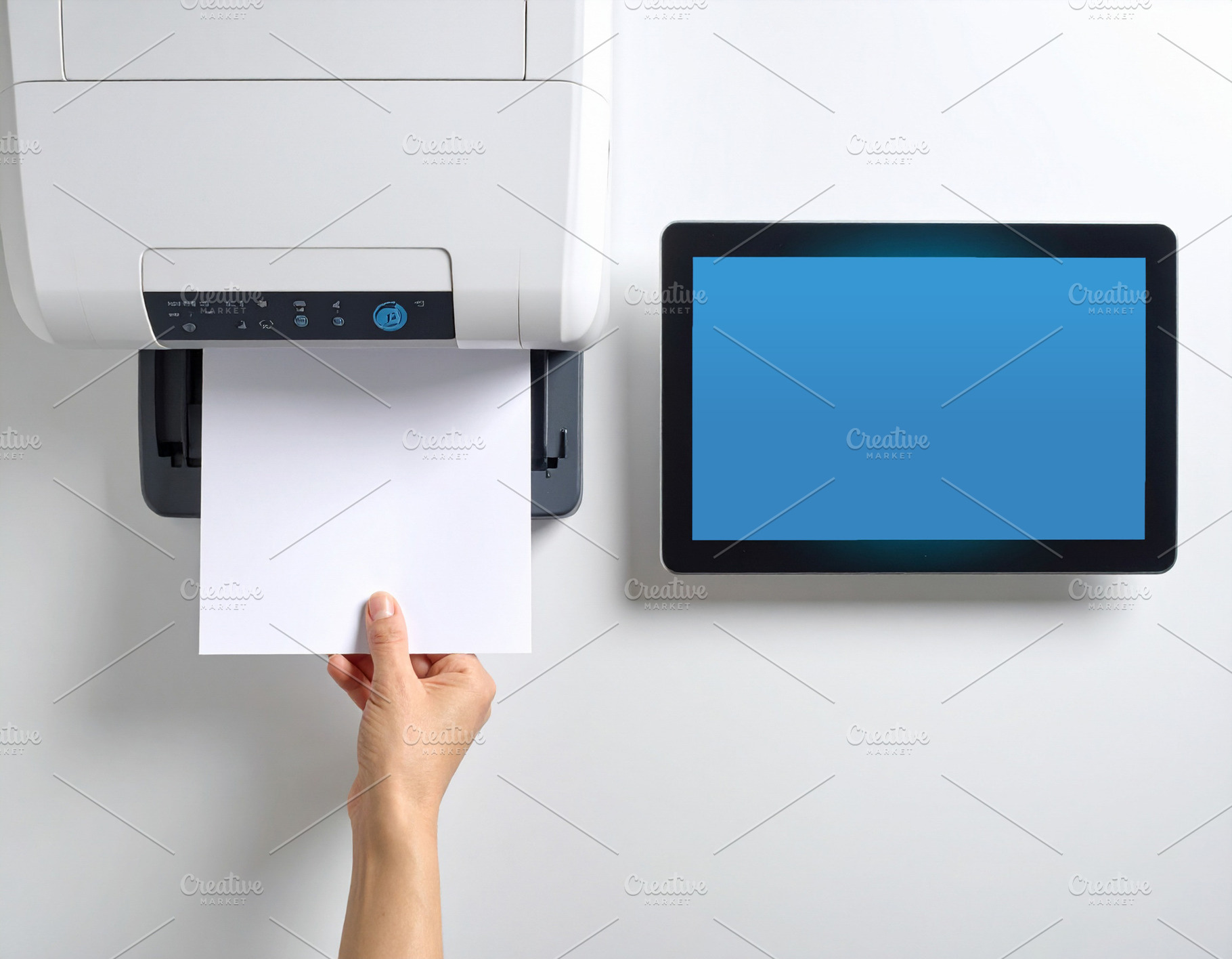 Hand placing a paper document into a print, a Technology Photo by DanFLCreativo