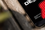 iPhone Mockup on Wooden Desk, a Device Mockup by Jiwstudio (Thumbnail 9 of 9)