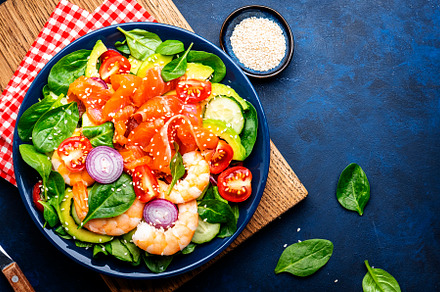 Fresh salad for keto diet with salmon, avocado, spinach, cucumbe, a Food & Drink Photo by 5PH