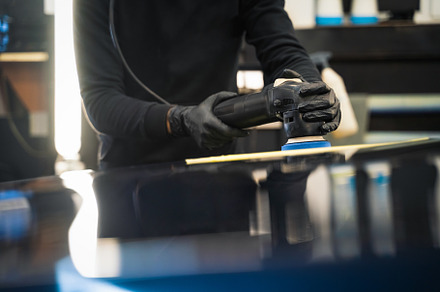 Professional car paint polishing, a Photo by borodai94