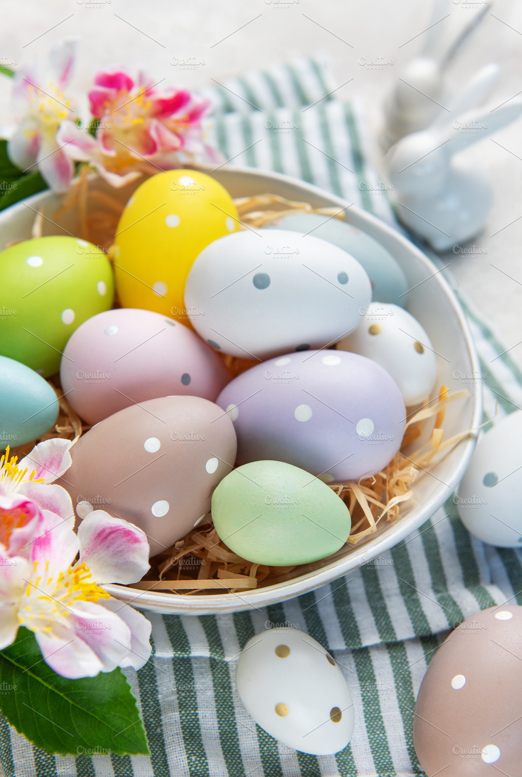 Colorful easter eggs with polka dots in a bowl, a Holiday Photo by Olena Rudo