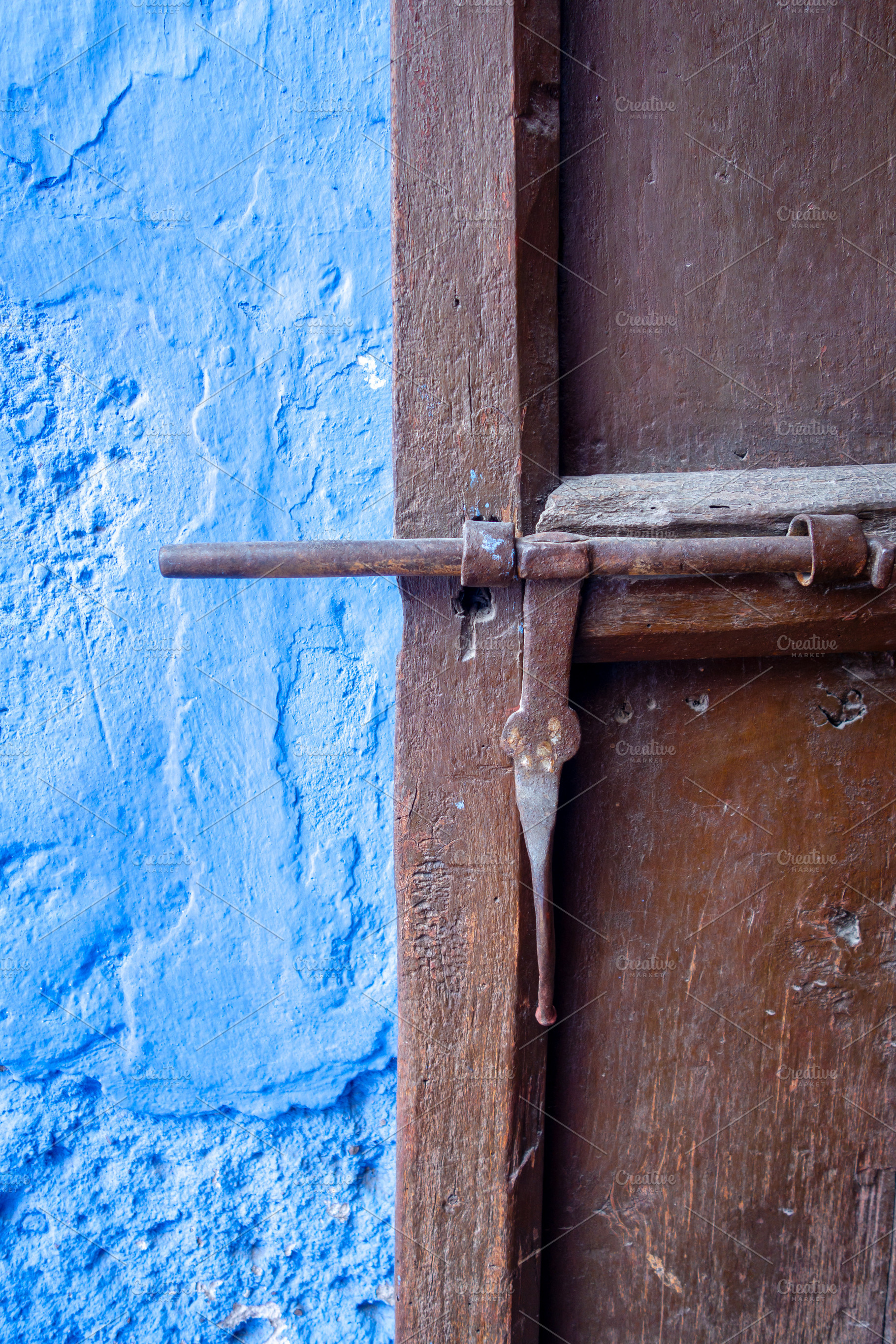 Wooden door close-up view with rusty, an Architecture Photo by GoodGoods