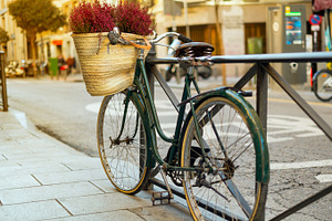 Bicycle at sunset featuring street, bicycle, and vintage