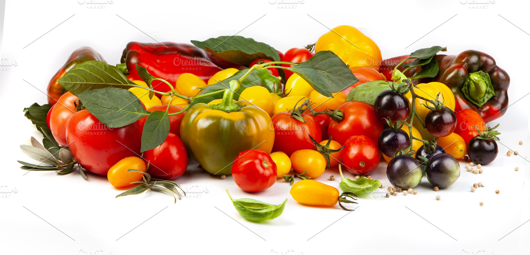 Assorted tomatoes and vegetables isolated on white background. P, a Nature Photo by eleana