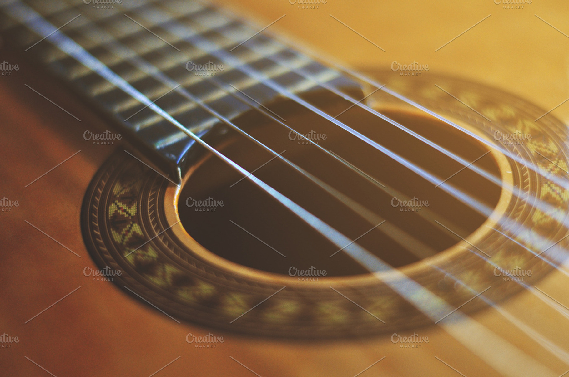 Guitar containing guitar, strings, and music