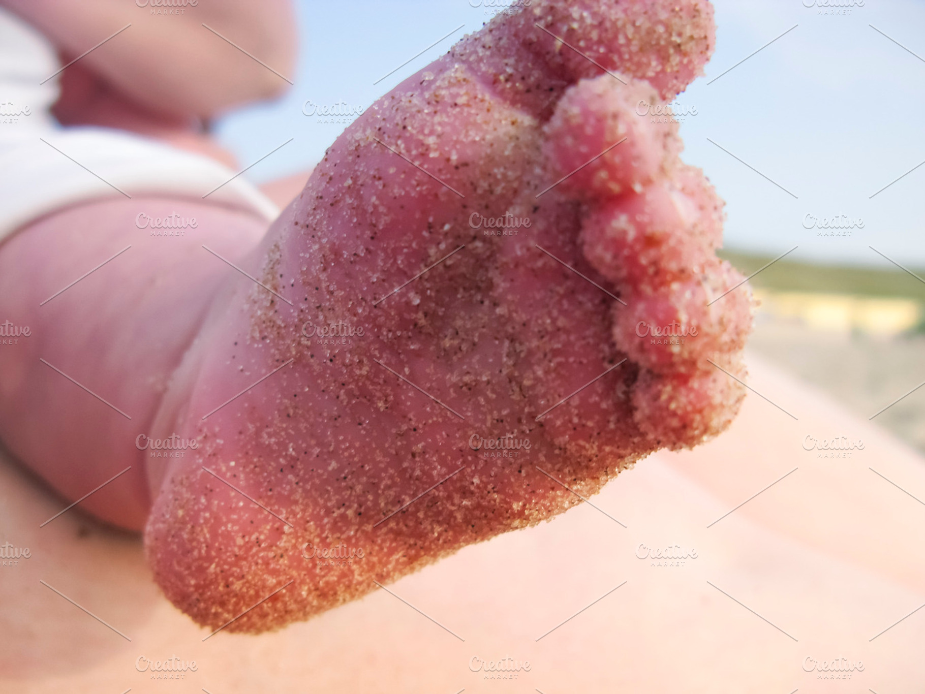 Sandy baby foot stock photo containing baby and foot