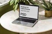 MacBook Laptop Mockup with Plants, a Books & Magazine Mockup by Area Mockups (Thumbnail 1 of 2)