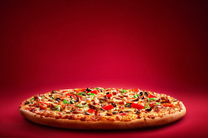 Round pizza with varied toppings, golden crust, and bubbling che, a Photo by Studio ANNA