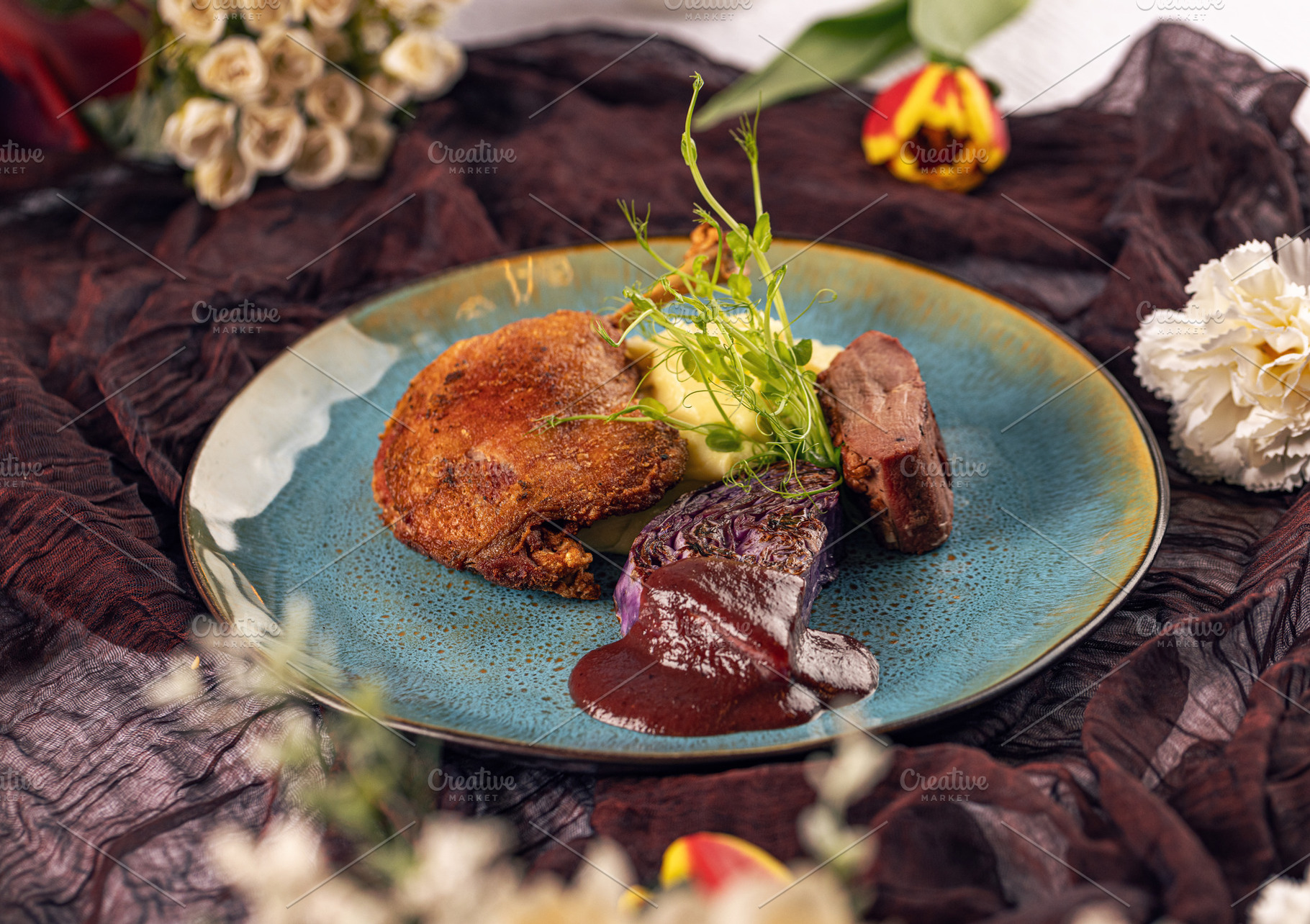 Roasted duck confit with mashed potatoes, a Photo by Grafvision photography