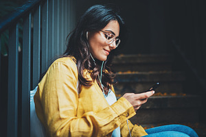 Hipster girl typing text message containing background, beautiful, and blogger