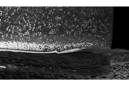 Close-up of small bubbles floating, a Food & Drink Photo by Media Whale Stock