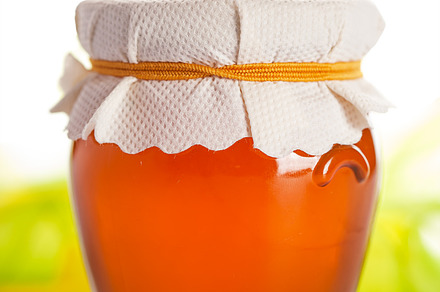 Glass jar with honey containing background, closeup, and color preview 6