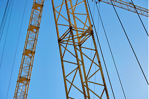 Construction crane working high, an Industrial Photo by darksoul72