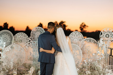 bride and groom against the backdrop of a yellow sunset, a Person Photo by Weddings, People, Travel