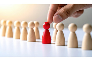 Red pawn being selected among beige, a Business Photo by Igor Tichonow
