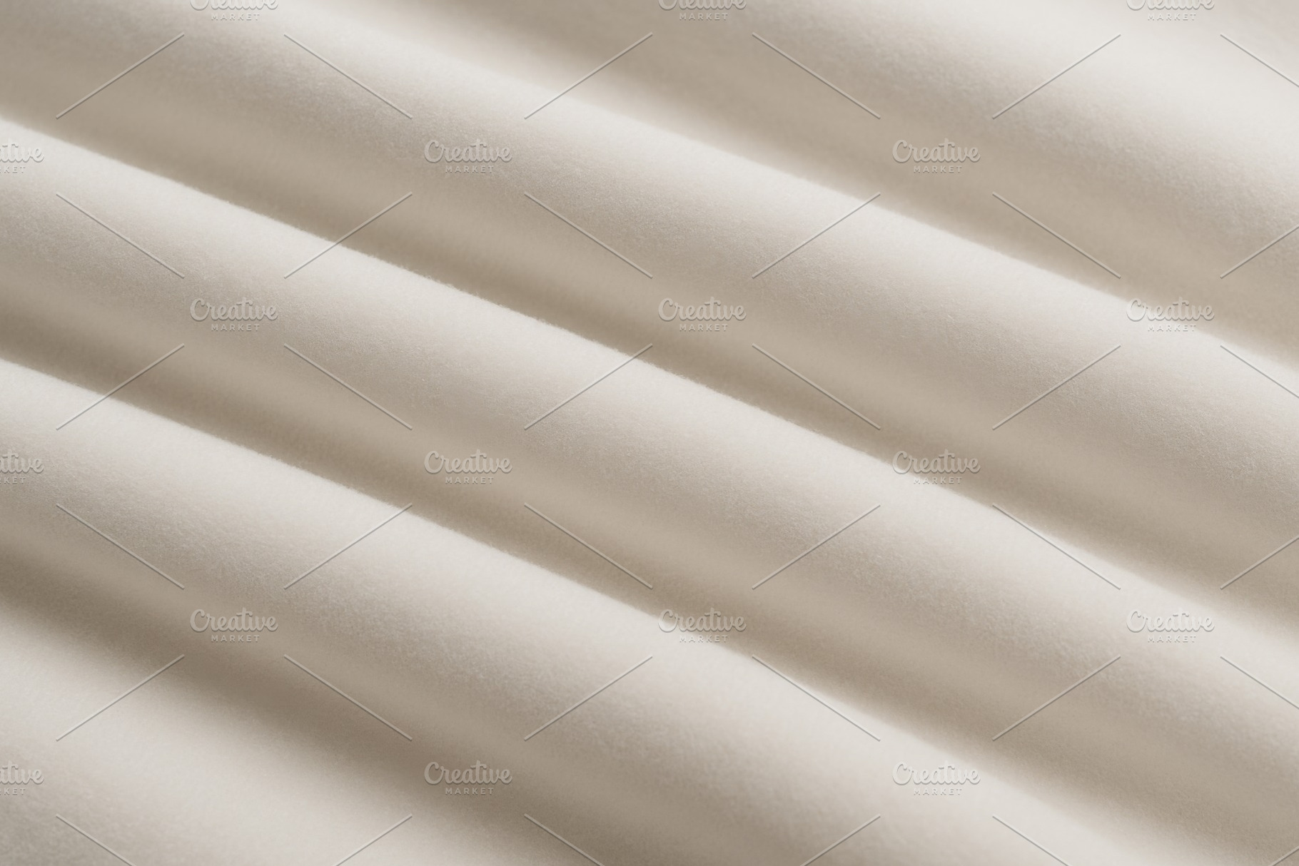 Soft cream fabric folds create gentle waves, ideal for elegant b, a Photo by Dvoevnore photos