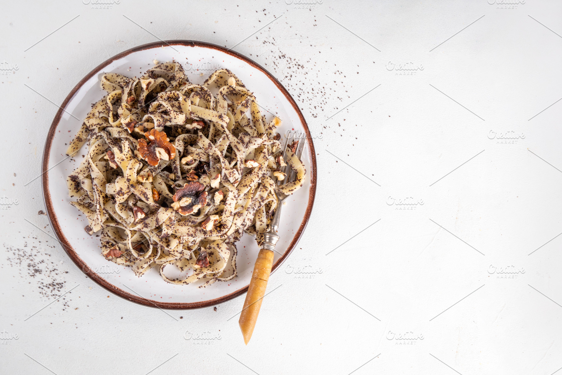 Sweet pasta, noodles with poppy seed and nuts, a Food & Drink Photo by Rimma