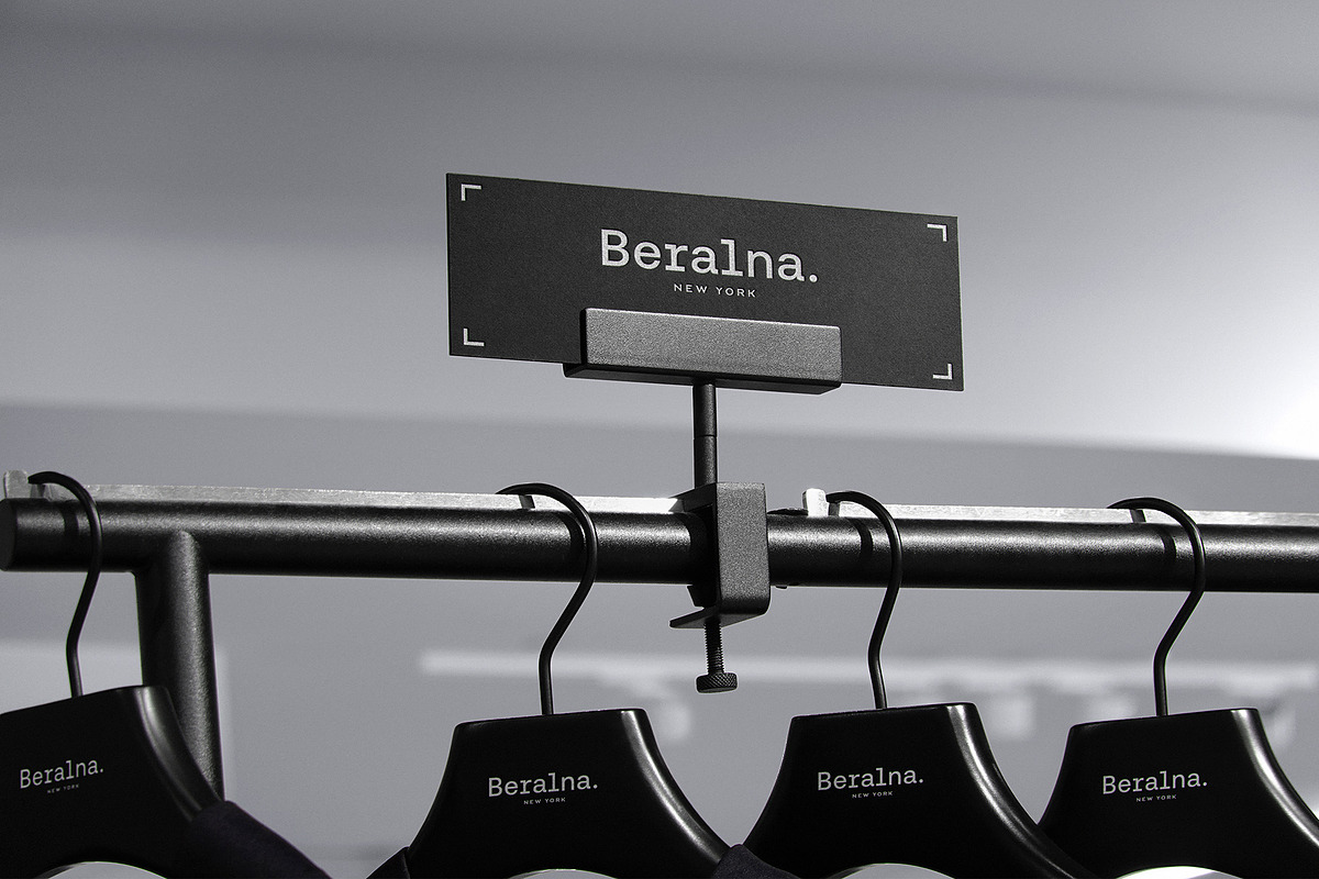 Logo Mockup Clothing Hanger Sign, a Product Mockup by Asylab (Photo 2 of 5)