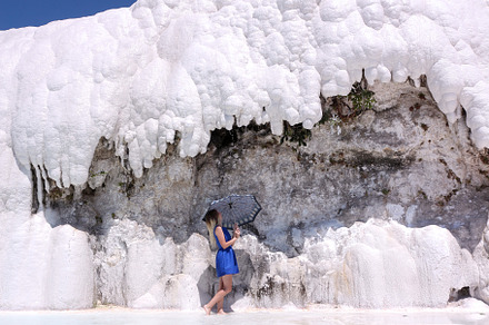 Woman under umbrella, white cliffs, a Holiday Photo by Irina