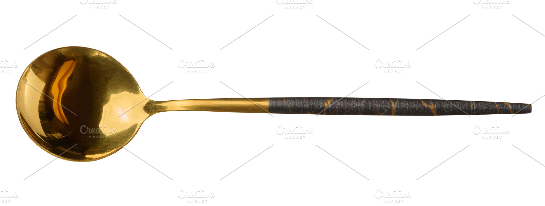 Golden metal spoon with dark patterned handle on isolated backgr, a Food & Drink Photo by ndanko