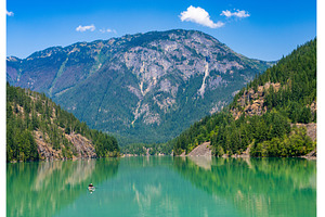 Paddleboard on Diablo Lake in North, a Nature Photo by Backyard Stock