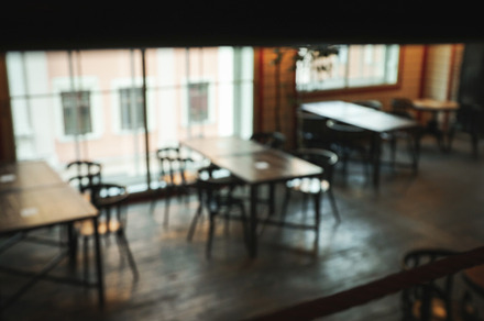 Photo of restaurant with empty wooden tables, an Architecture Photo by AtlasStudio PRO
