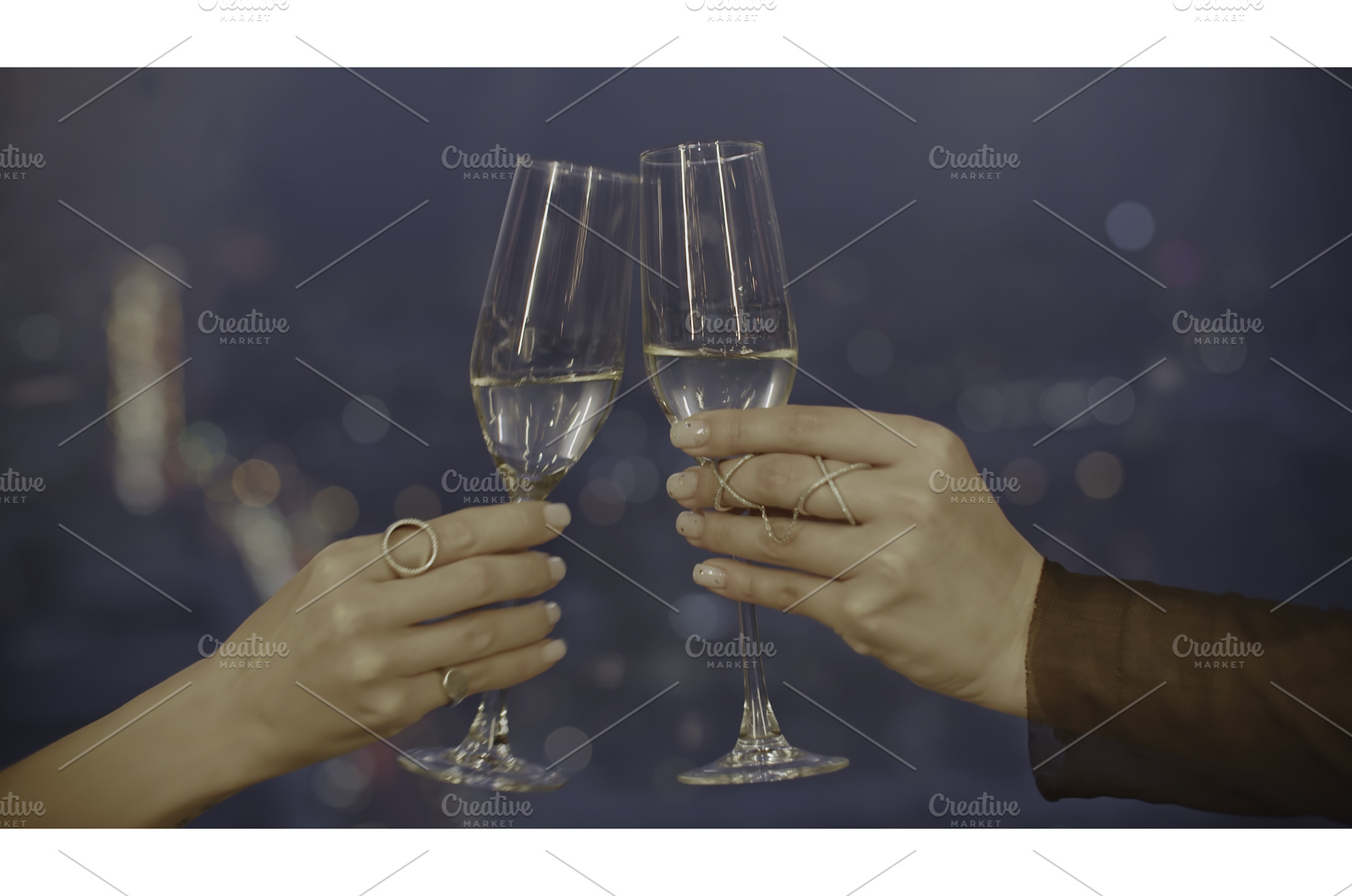 Close-up of two female hands, a Holiday Photo by Media Whale Stock