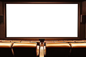 Comfortable theater seats facing a large blank screen in a cinema, a Photo by AlyaAnd