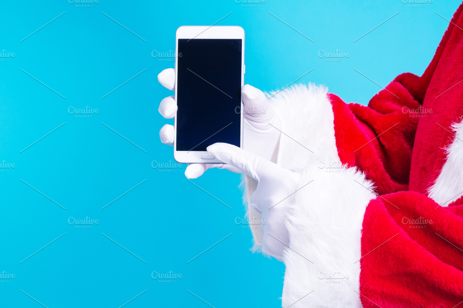 Santa claus with his cell phone containing cellphone, phone, and claus, a Technology Photo by tetxu