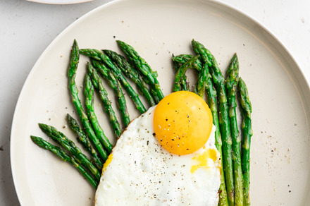 Fried eggs with green asparagus. Fast lunch ideas, healthy break, a Food & Drink Photo by FoodStock