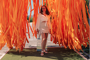 Woman Posing Among Bright Orange, a Person Photo by Jan Jack Russo Media