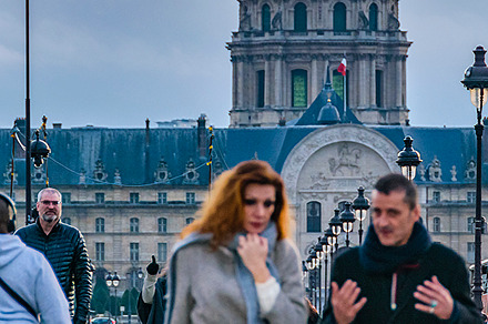 People walking at paris street, a Person Photo by DanFLCreativo