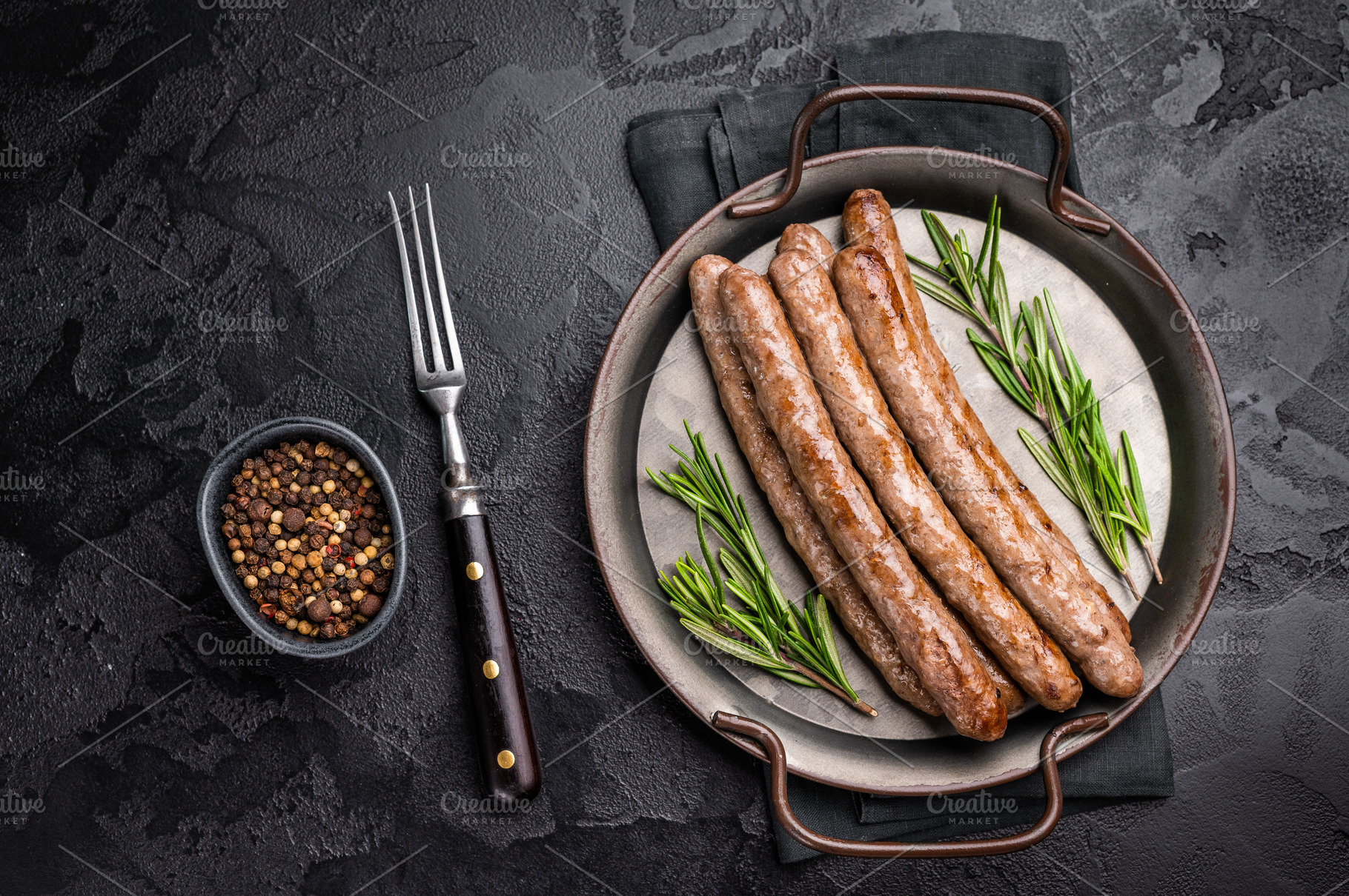 Juicy grilled sausage sizzling on the barbecue, perfect for summ, a Food & Drink Photo by composter-box@mail.ru