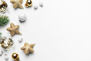 Christmas holiday decorations on white background flat lay, a Holiday Photo by Olena Rudo