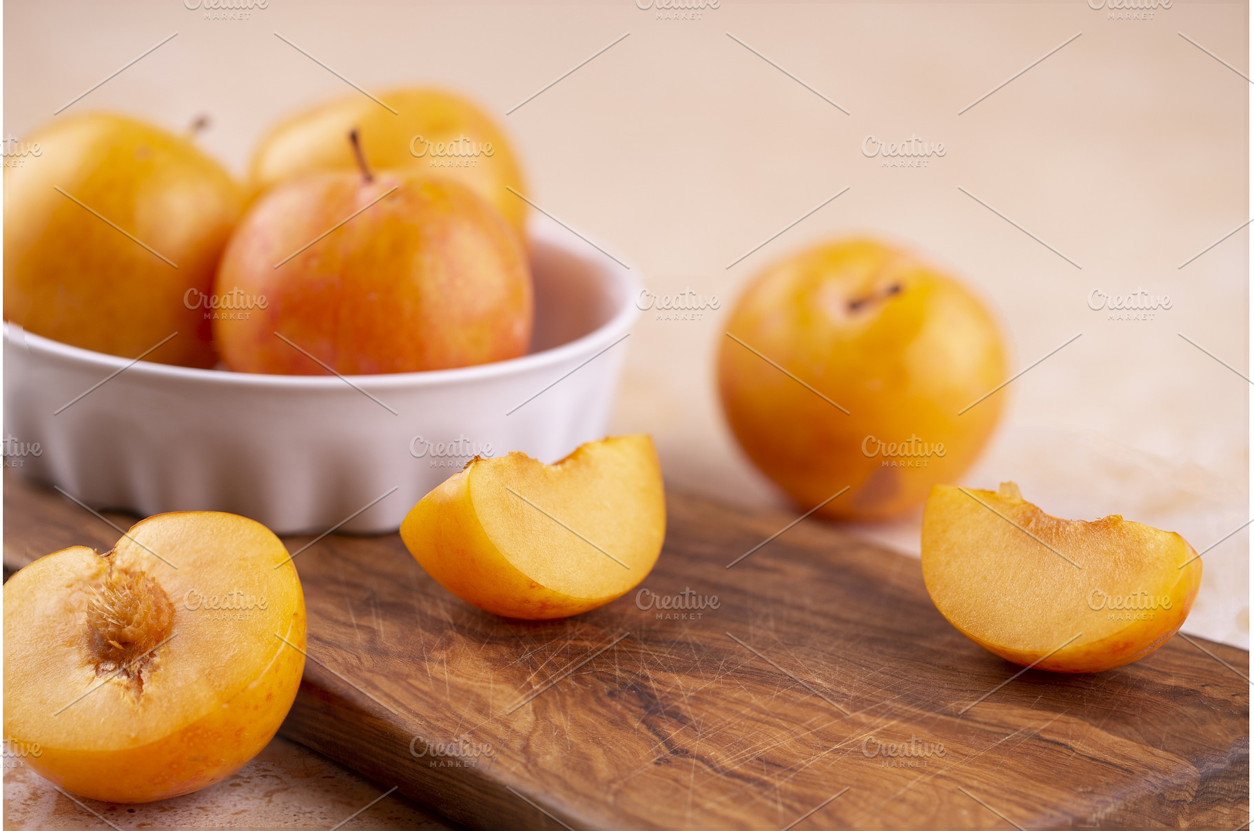 Close-up of yellow plums in a white, a Food & Drink Photo by Diary of impressions