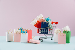 Paper shopping bags in a cart