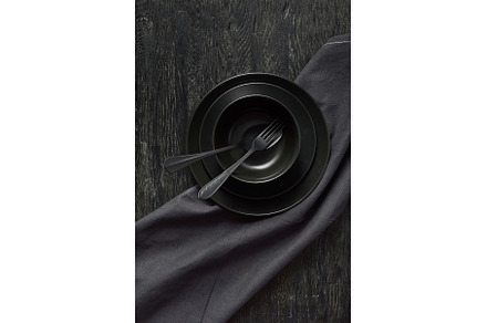 Kitchen table served with black, a Food & Drink Photo by Yaroslav Danylchenko