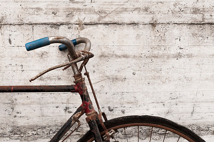 Antique or retro oxidized bicycle stock photo containing outdoor and transport