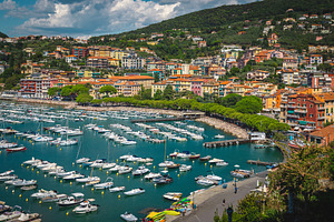 Harbor and seaside buildings, an Architecture Photo by Alpine Dreams