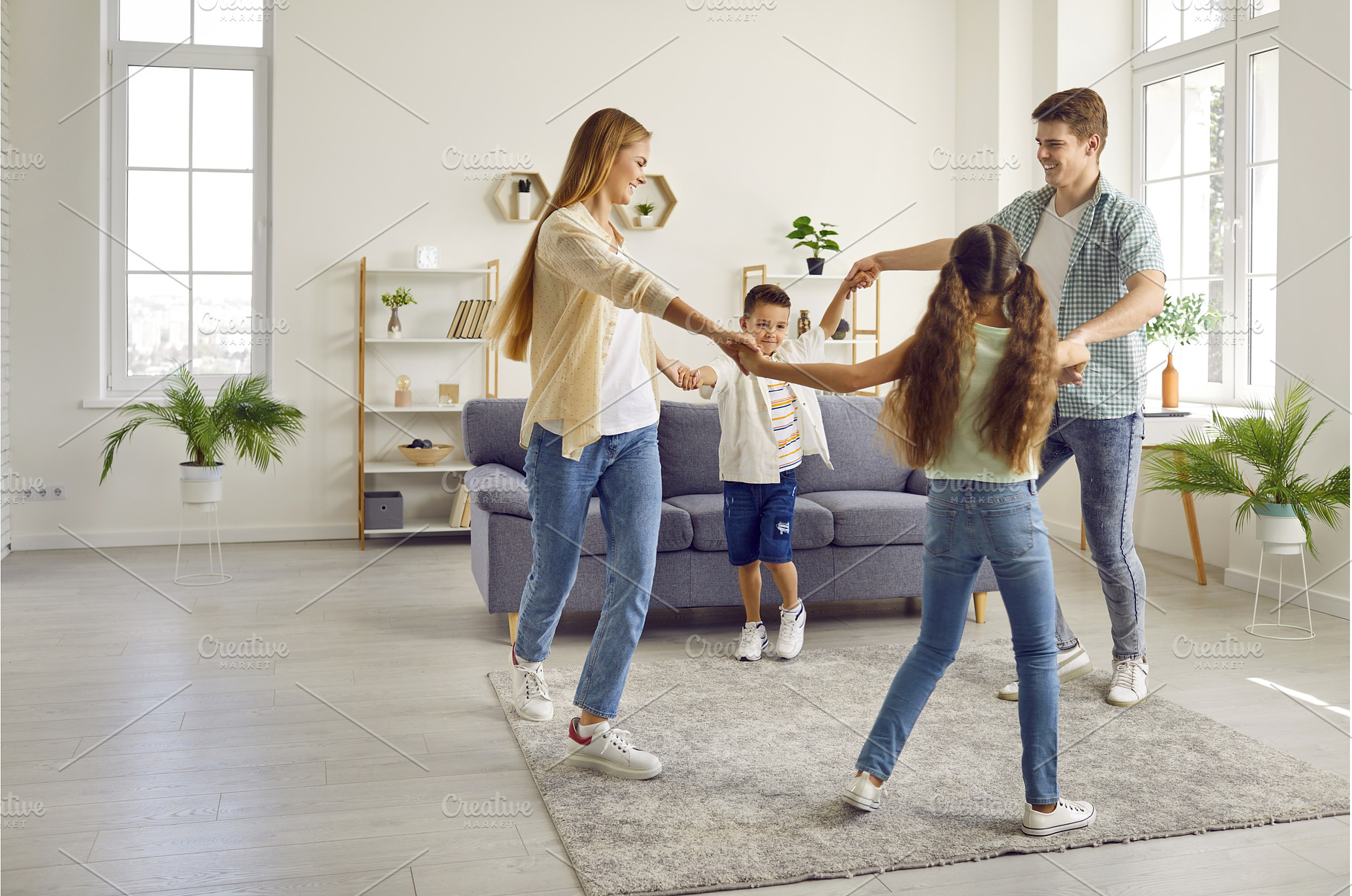 Happy family with two children are, a Person Photo by StudioRomantic