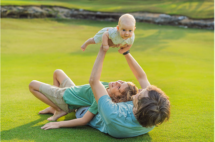 Father, older son, and newborn baby
