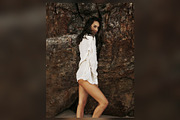 White Shirt Against Beach Rocks, a Beauty & Fashion Photo by Chris Joel Campbell (Thumbnail 1 of 2)