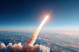 Rocket ascending into space with fiery plume, a Technology Photo by AlyaAnd