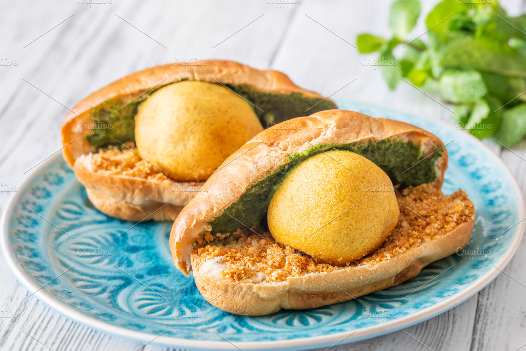 Vada Pav Indian street food served o, a Food & Drink Photo by Alexander Prokopenko