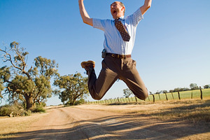 Leaping Businessman In Air, a Person Photo by THP Creative