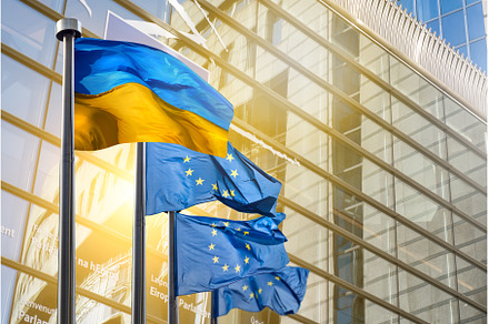 Flags of Ukraine and European Union, a Business Photo by Yaroslav Danylchenko